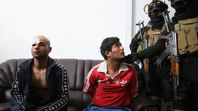 In this December 19, 2015 photo suspects murderers and thieves in the police custody at police headquarters in Basra, 50 kilometres southeast of Baghdad. Nabil Al Jurani / AP Photo