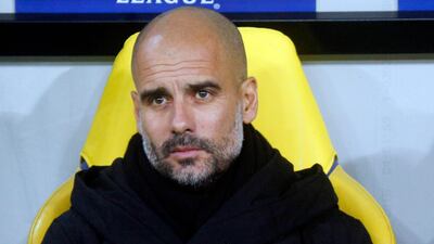 Manchester City manager Pep Guardiola was charged by the English Football Association for promoting a political message by wearing a ribbon to support of imprisoned and ousted pro-independence Catalan politicians. Efrem Lukatsky / AP Photo