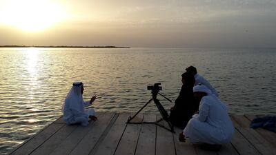 J Al Romaithi, a fisherman, is filmed at Marawah Island for a documentary about the state of the UAE's fisheries and what is being done to help them recover. Courtesy Environment Agency Abu Dhabi