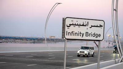 Sheikh Mohammed drives on Infinity Bridge.
