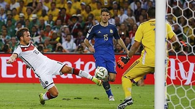 Germany’s Mario Gotze shoots to score a goal past Argentina’s goalkeeper Sergio Romero during extra-time in their 2014 World Cup final at the Maracana Stadium in Rio de Janeiro. Kai Pfaffenbach / Reuters