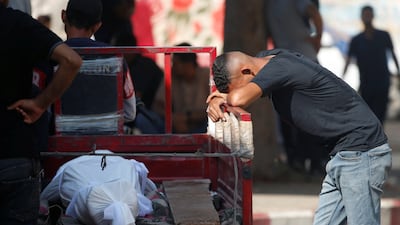 A mourner at the funeral of Palestinians killed by Israeli fire while waiting for aid in northern Gaza. Reuters