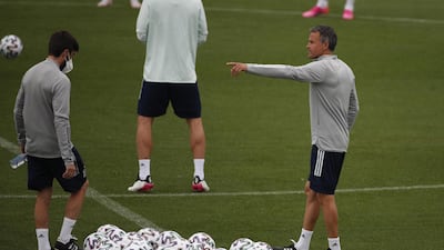 Spain manager Luis Enrique oversees training. EPA