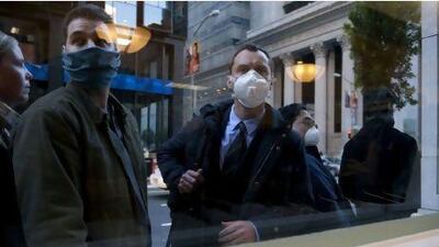 Jude Law, right, as Alan Krumwiede in the thriller Contagion. Courtesy Warner Bros. Pictures