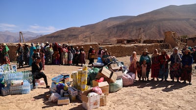 Women queue for humanitarian aid in Ighil Ntalghoumt. Reuters
