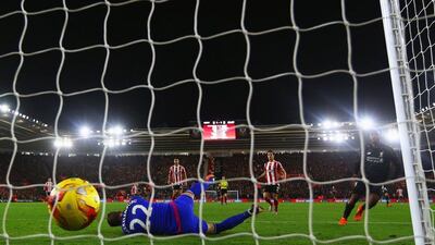 Liverpool’s Daniel Sturridge beats goalkeeper Maarten Stekelenburg of Southampton to score their second in the League Cup on Wednesday night. Michael Steele / Getty Images