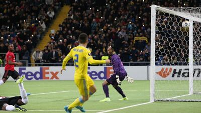 Manchester United's Di'Shon Bernard scores an own goal in the Europa League Group L match at the Astana Arena. Reuters