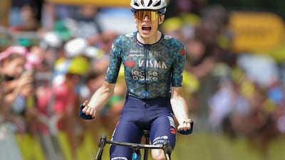 Team Visma-Lease a Bike's Jonas Vingegaard celebrates at the finish line. AFP