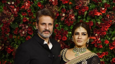 Raveena Tandon with her husband Anil Thadani. AFP