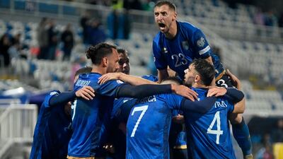 Kosovo players celebrate their 1-0 victory over Israel. AFP