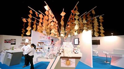 Nearly 300,000 companies can be classified as part of the SME sector in the UAE. Above, vendors representing small businesses at the Abu Dhabi Entrepreneurship Forum. Sammy Dallal / The National