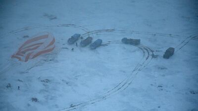 A search and rescue team approaches the Soyuz MS-06 space capsule carrying the International Space Station (ISS) crew of Russian cosmonaut Alexander Misurkin and NASA astronauts Mark Vande Hei and Joe Acaba after it landed in a remote area outside the town of Zhezkazgan, Kazakhstan. Alexander Nemenov / EPA