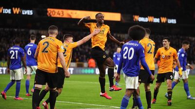 Wolverhampton Wanderers' Willy Boly celebrates scoring with team-mates but it is later ruled out for offside during the Premier League match at Molineux. PA