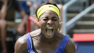 Serena Williams yells out after losing a point to her sister Venus at the Rogers Cup tennis tournament on Saturday Aug. 9, 2014 in Montreal. Venus won 6-7, 6-2, 6-3. AP Photo/The Canadian Press