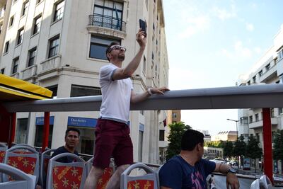 Tourists take in the view from the double-decker bus. Courtesy India Stoughton