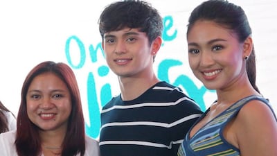 Director Antoinette Jadaone with stars James Reid and Nadine Lustre. Courtesy Star Cinema