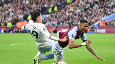 Ezri Konsa of Aston Villa is fouled by Edson Alvarez of West Ham United to earn a penalty. Getty