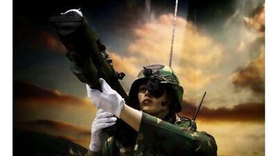 A mannequin holds an anti-aircraft weapon at the International Defence Exhibition and Conference in Abu Dhabi. A reader stresses the security and economic benefits of the event. Lee Hoagland / The National