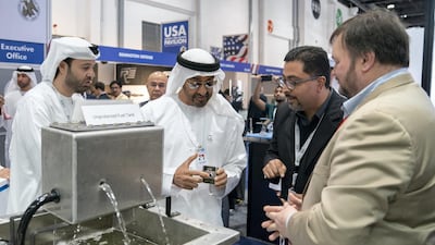 Sheikh Mohamed tours the exhibition hall.