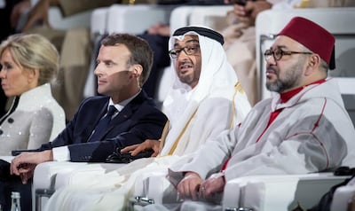 King Mohamed VI of Morocco (R), Sheikh Mohamed bin Zayed Al Nahyan, Crown Prince of Abu Dhabi Emmanuel Macron, President of France (3rd R), attend the opening ceremony of the Louvre Abu Dhabi. Hamad Al Kaabi / Crown Prince Court