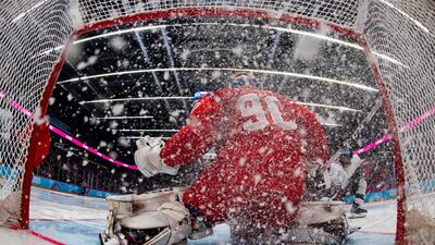Russian netminder Sergei Ivanov saves from US player Gavin Brindley in the men's ice hockey 6-team tournament final at Vaudoise Arena, during the 2020 Lausanne Winter Youth Olympic Games on Wednesday, January 22. Russia won the match 4-0. AFP