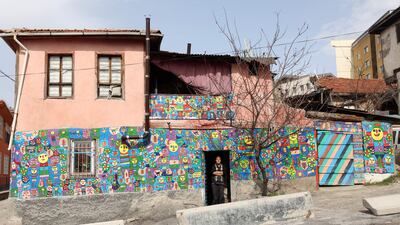 The mural features images of cartoon-like characters.