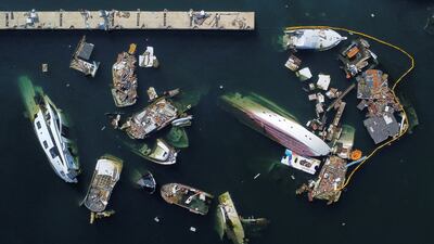 Damaged boats a month after Hurricane Otis hit Acapulco, Mexico. Reuters