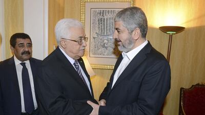 The Palestinian president Mahmoud Abbas and Hamas chief Khaled Meshaal meet for talks in Doha on May 5, 2014. Thaer Ghanaim / Reuters