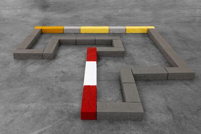 In the centre of the space, the concrete paver sculpture 'Watch Your Step' evokes roadside caution and hazard warnings. Photo: Carbon 12