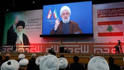 Hezbollah secretary general Naim Qassem makes a televised speech. The Iran-backed group rejects calls for its disarmament. EPA
