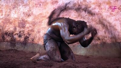 Wrestlers cover themselves with mud before a bout, ensuring they maintain their grip. Sanket Jain for The National