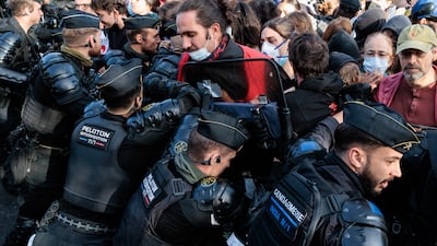 French riot police intervene in Paris during a national day of protest. EPA