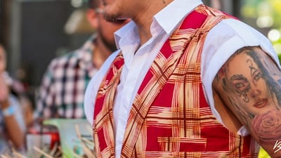 Liverpool star Roberto Firmino is as vibrant as his ear studs. Instagram / @roberto_firmino.