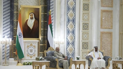 HH Sheikh Mohamed bin Zayed Al Nahyan Crown Prince of Abu Dhabi Deputy Supreme Commander of the UAE Armed Forces (R) and HE Narendra Modi, Prime Minister of India (L), attend an MOU signing ceremony, at the Presidential Palace. Photo: Hamad Al Mansouri for Crown Prince Court - Abu Dhabi