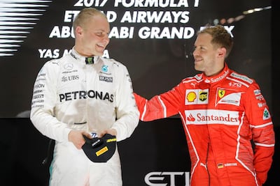 Valtteri Bottas, left, and Sebastian Vettel. Valdrin Xhemaj / EPA