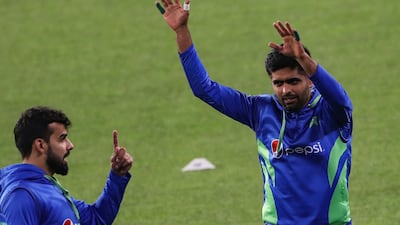 Pakistan's captain Babar Azam, right, trains for the T20 World Cup match against India in Melbourne on Saturday, October 22, 2022. AFP