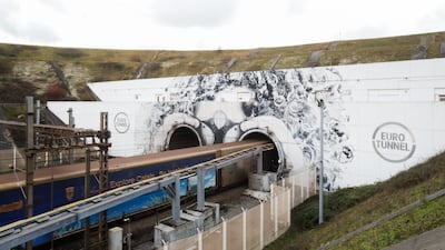 A train passes through the Channel tunnel in Coquelles, northern France. A strike by French workers has come to an end. EPA
