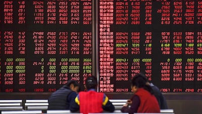 Global stocks hurt by China’s trade threats, falling bond yields. Fred Dufour / AFP