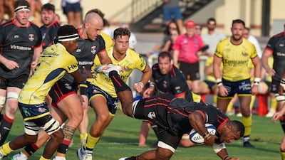 Action from the the UAE Premiership final between Dubai Exiles (black) v Dubai Hurricanes (yellow) held at The Sevens in Dubai