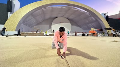 Workers make last minute preparations at Bahrain National Stadium, where Pope Francis will hold a public Mass during his three-day visit to Manama, Bahrain. All photos from this image onwards: Reuters