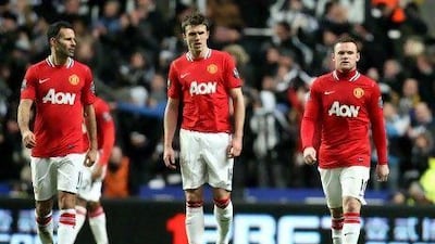 Michael Carrick, left, and Wayne Rooney know it would be nice to knock out Manchester City after a chaotic build-up.