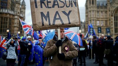 Protesters outside the Houses of Parliament in London. Reuters