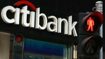 Citigroup, which owns Citibank, has confirmed earlier reports that it is to shed staff and says 52,000 people will be let go.