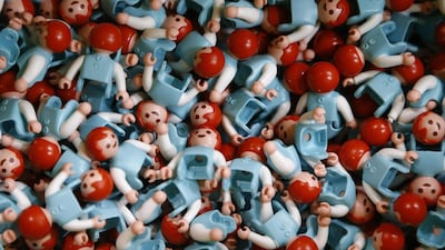 Playmobil toy figures are seen in a box at the manufacturing plant of Geobra Brandstaetter in Zirndorf near Nuremberg. Darrin Zammit / Reuters