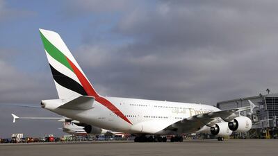 An Emirates Airbus A380 arrives at Terminal D at Dallas-Fort Worth International Airport. Emirates has ordered more A380s. Tony Gutierrez / AP Photo