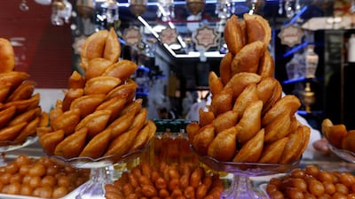 Traditional sweets known as qatayef, commonly served during Ramadan, the fasting month Ramadan, at a shop in the Midan neighbourhood of Damascus, Syria. AFP