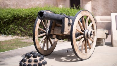 A cannon by the front entrance.