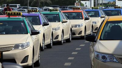 All Dubai taxis will be fitted with surveillance cameras by the end of 2018 the RTA has said. Satish Kumar / The National