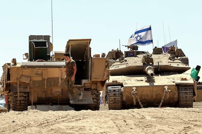 Israeli armoured vehicles positioned near the border with Gaza. AFP