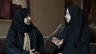 Salwa Al Rahma, left, who survived two bouts of cancer, with her sister Sawsan who recovered from Hodgkin lymphoma, at a Friends of Cancer Patients Society meeting in Dubai. Antonie Robertson/The National